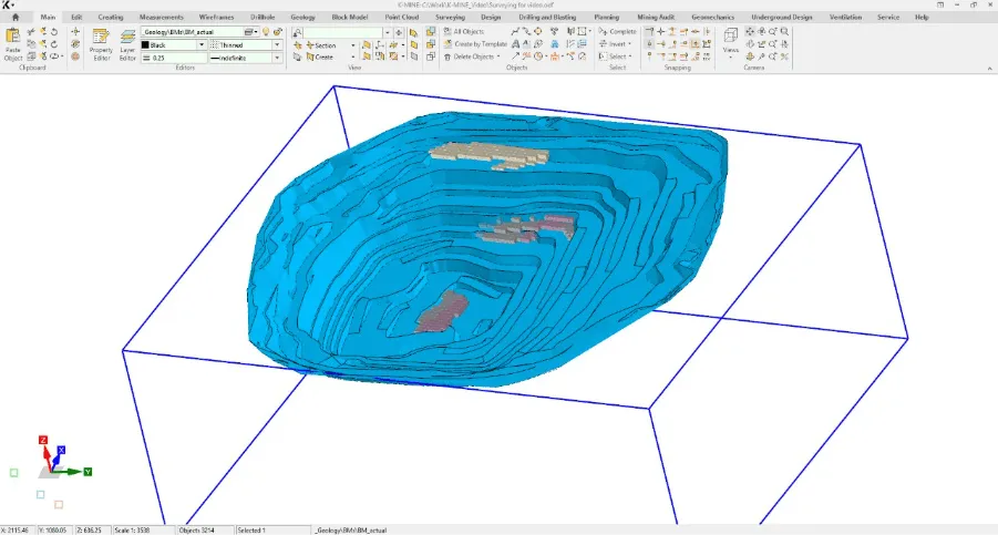 Volume calculation and pit monitoring dashboard comparing design and actual mine surfaces in K-MINE.